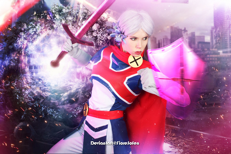 A person in a vibrant costume with a shield and sword, striking a fierce pose against a dramatic, colorful background.