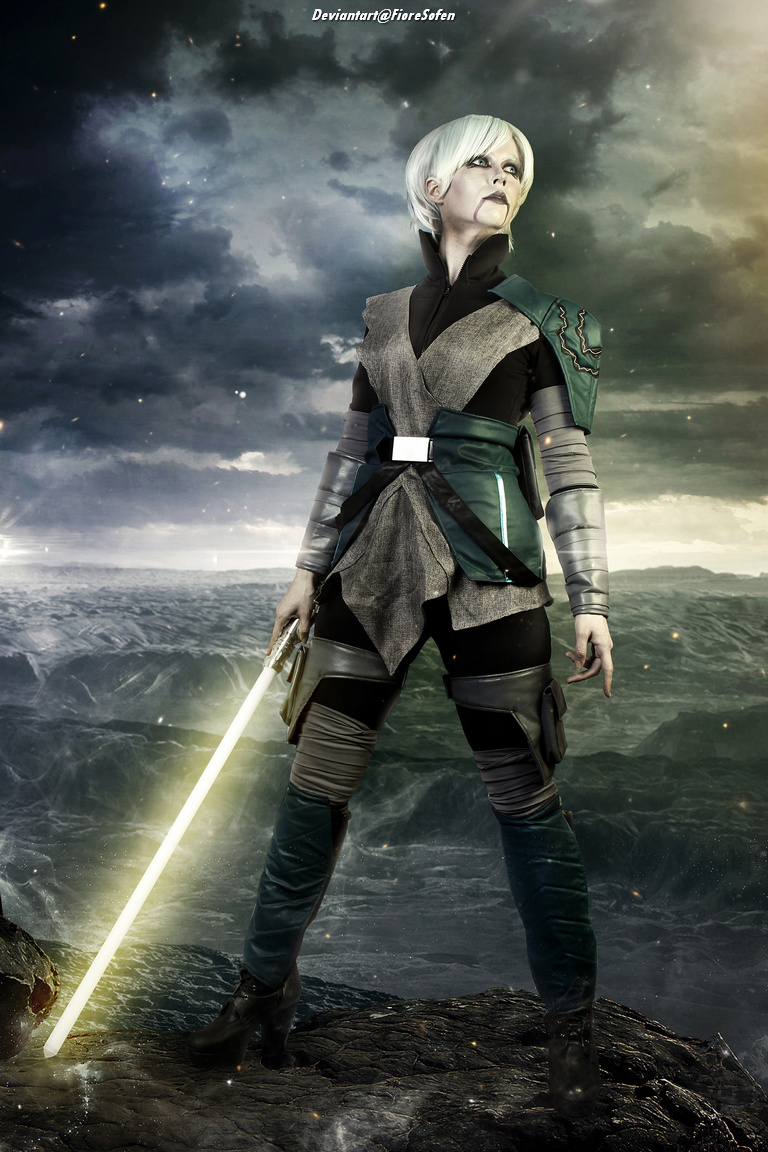A character in a futuristic outfit stands confidently on a rocky landscape, holding a glowing lightsaber, with stormy skies and ocean waves in the background.