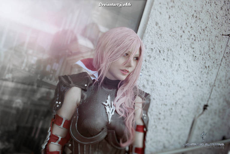 A character in a cosplay outfit with long pink hair and armor, standing near a window.