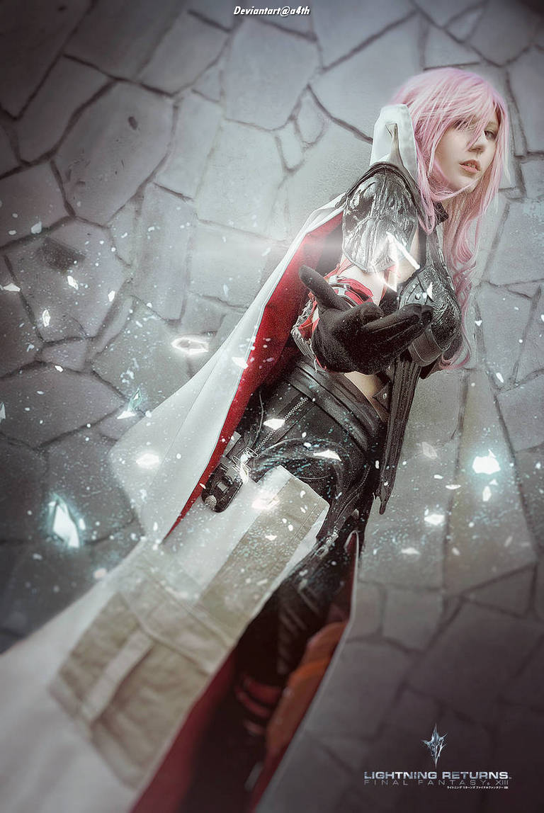 Cosplay of a character from 'Lightning Returns: Final Fantasy XIII', featuring a female figure with pink hair, wearing a detailed black and red outfit and cape, with a dramatic pose against a stone backdrop.