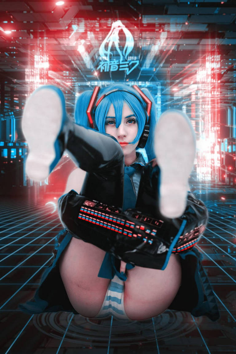 Vocaloid - Hatsune Miku Cosplay - full body portrait Vocaloid - Hatsune Miku Cosplay - full body portrait