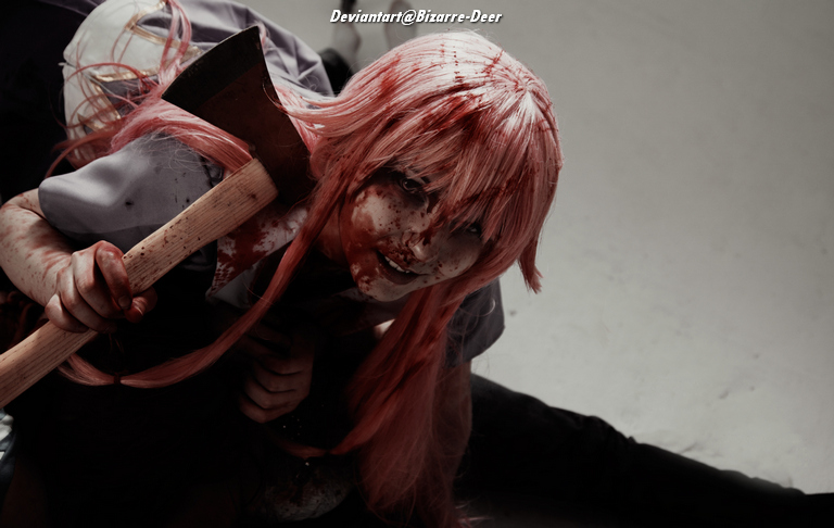 A person with pink hair wearing a school uniform, covered in blood, holding an axe while sitting on the floor.