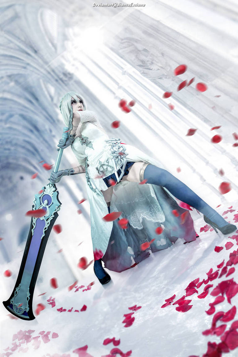 A warrior woman in a flowing blue and white dress poses dramatically with a large sword amidst scattered red rose petals on a white floor, with a soft, ethereal background.