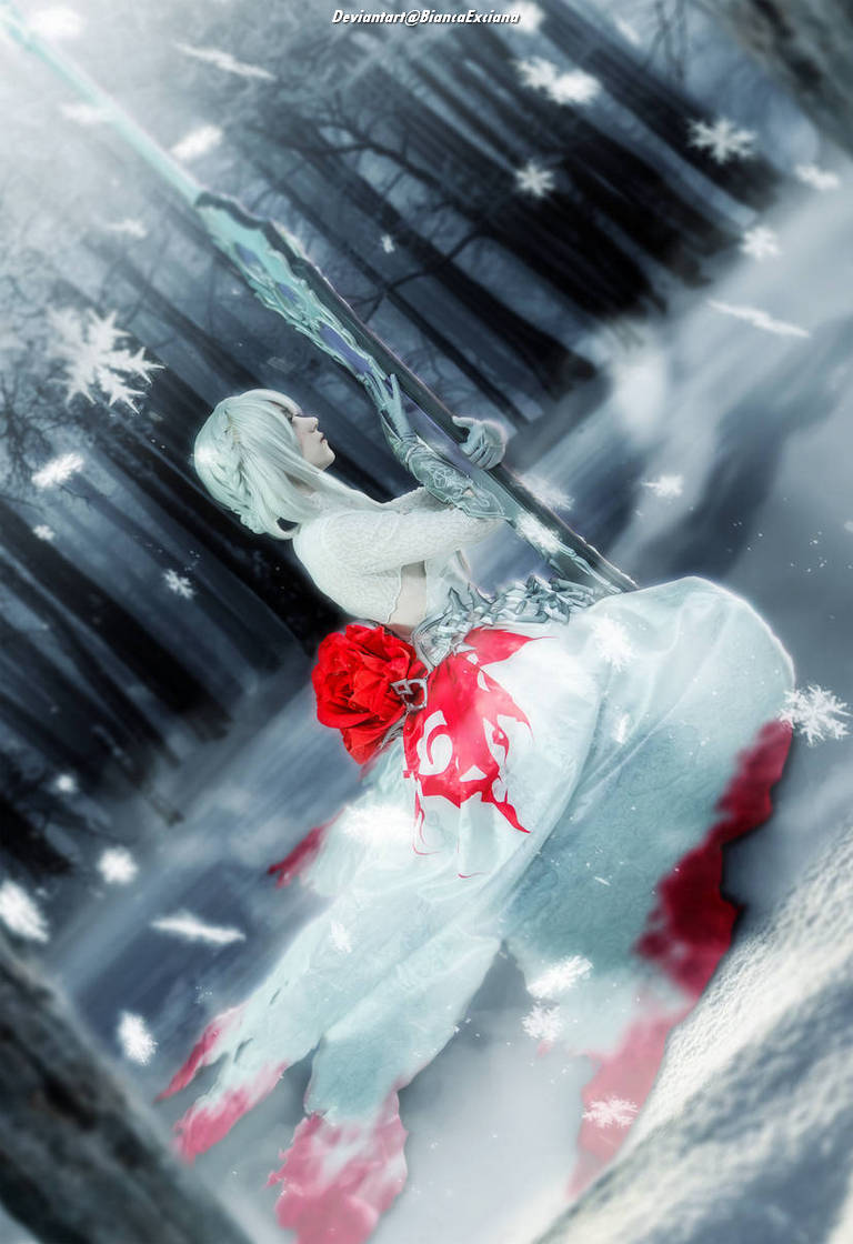 A fantasy character in a flowing white gown with red accents stands in a snowy landscape, holding a large, ornate ice spear. The background features a misty forest with falling snowflakes.