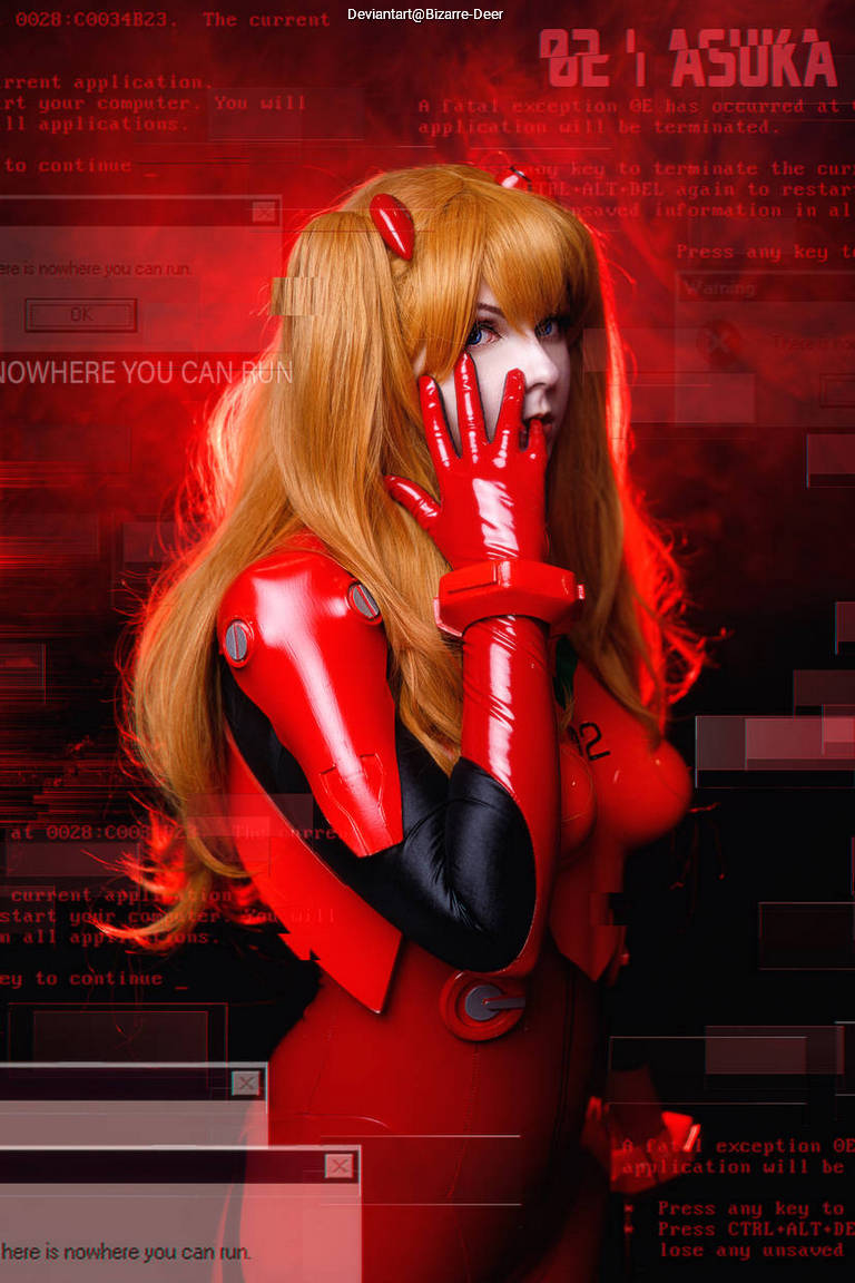 A person dressed as a character in a red and black suit with orange hair, posing against a background of glitchy computer screens and error messages.