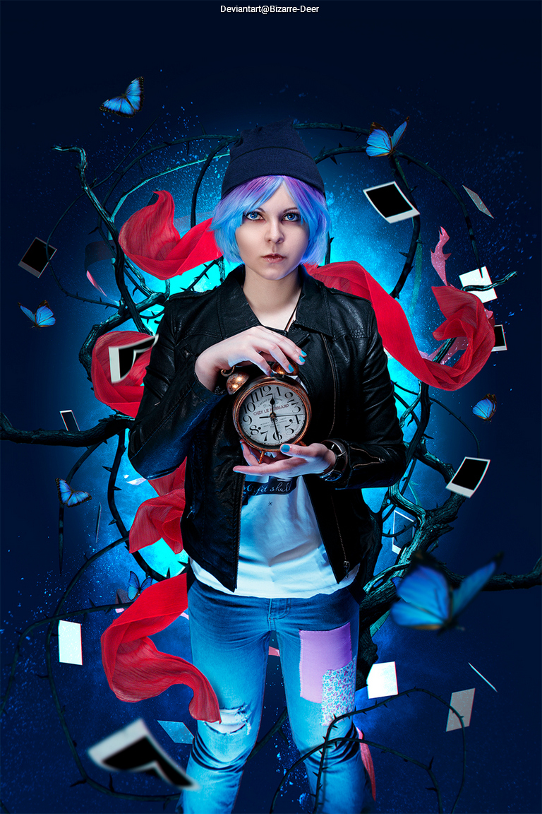 A person with blue hair and a beanie stands holding a clock, surrounded by floating butterflies and scattered photographs, with a dark background enhanced by bright blue light.