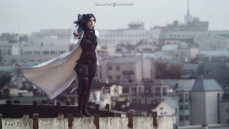 A person in a purple and white costume stands on a rooftop, overlooking a cityscape in a cloudy atmosphere.