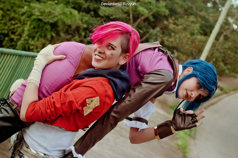 League of Legends - Vi (Violet) (The Piltover Enforcer) (Arcane Undercity) &amp; Caitlyn Kiramman (The Sheriff of Piltover) (Arcane Commander) Cosplay - full length photo