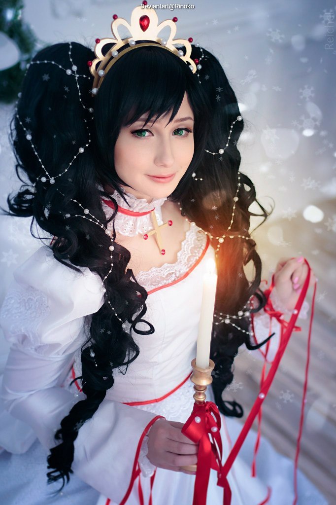 Portrait of a woman in a white dress with red accents and a crown, holding a candle and decorative ribbons, with snowflakes in the background.