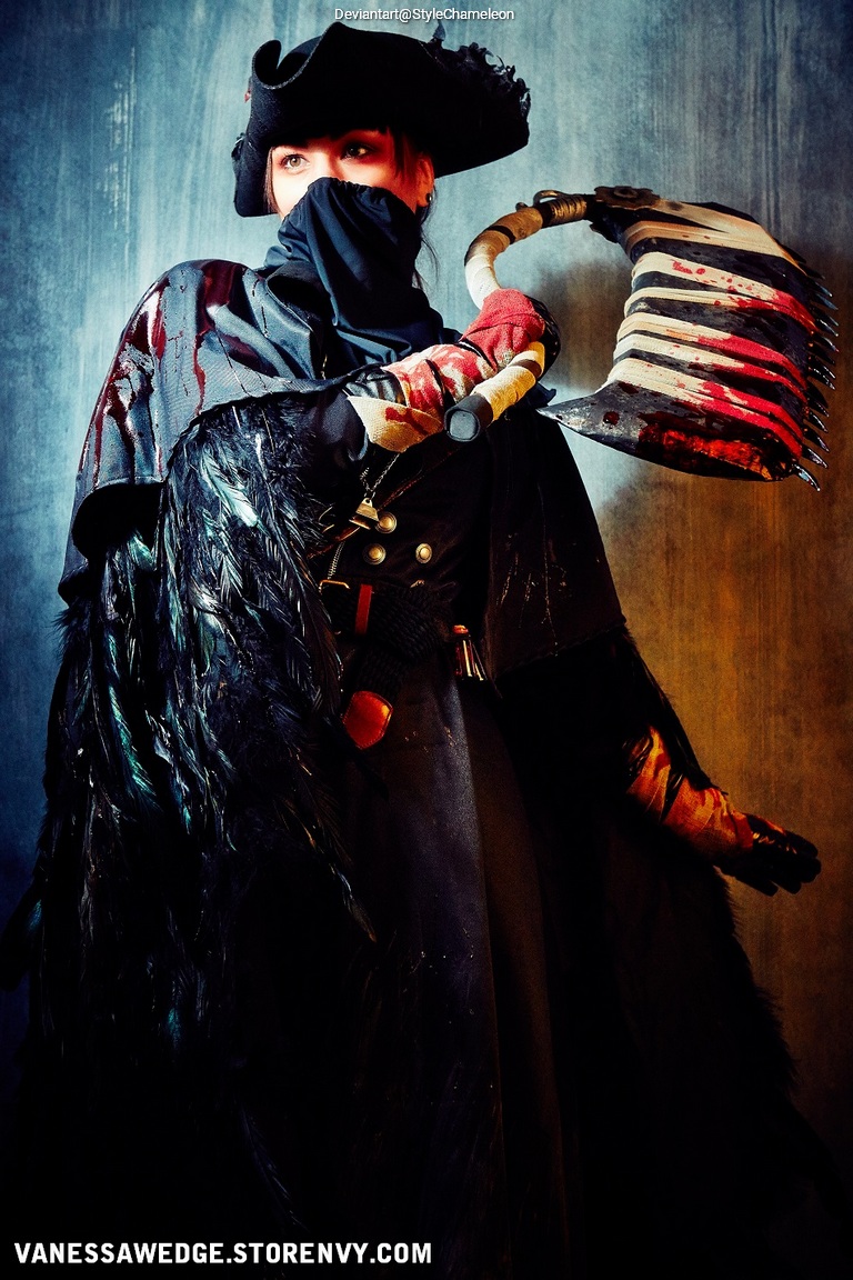 A person dressed in a dark, elaborate costume with feathers and a hat, holding a weapon resembling a scythe, set against a textured background.