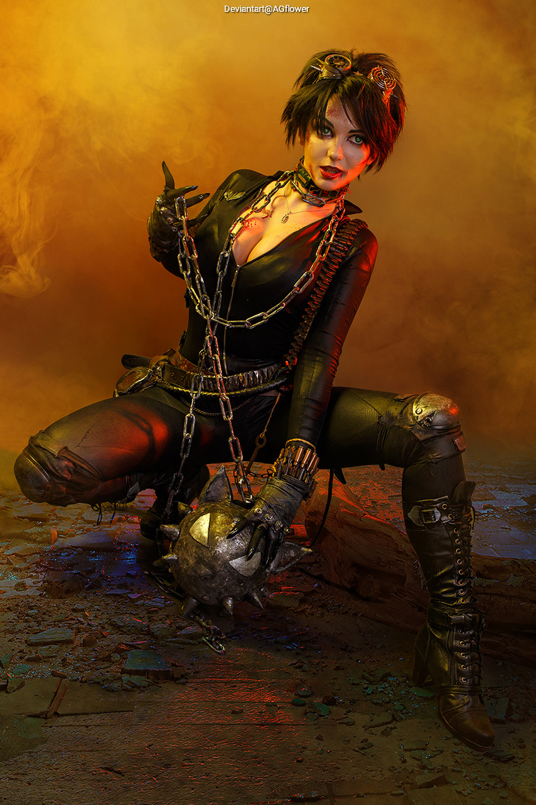 A female character dressed in a dark outfit with chains, posing in a dramatic, colorful environment filled with smoke.
