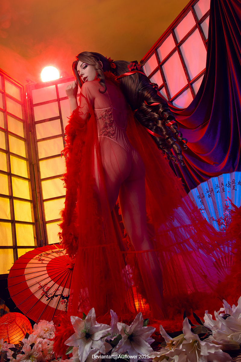 A woman in a red sheer outfit poses against a backdrop of illuminated screens, adorned with traditional Japanese umbrellas and white lilies, creating a dramatic and captivating atmosphere.