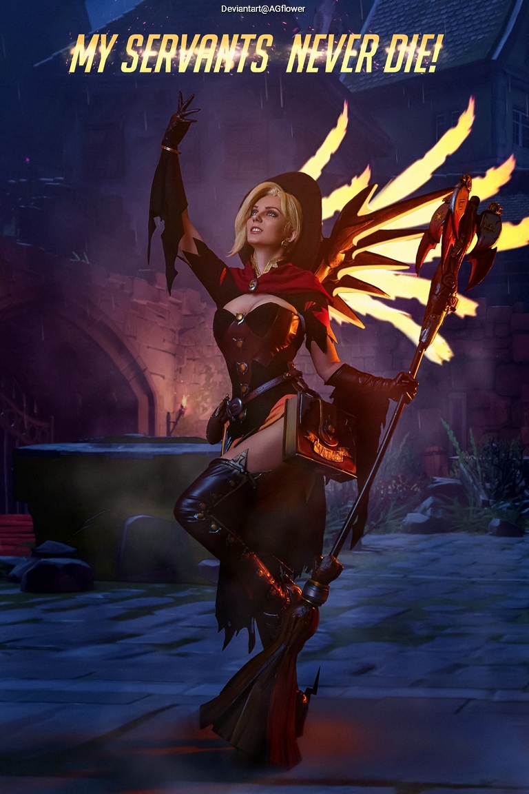 A fantasy character with blonde hair dressed in a dark, revealing outfit holding a staff, surrounded by a mystical background, with the text 'MY SERVANTS NEVER DIE!' above her.
